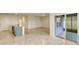 Open-concept living area and kitchen features granite countertops and stainless steel appliances at 868 Brooklet Dr, Davenport, FL 33837