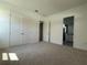 Bedroom features carpeted floors, walk-in closet, and ensuite bathroom at 931 Azalea Walk Cir, Deland, FL 32724