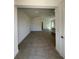 Spacious living room featuring tile flooring, bright lighting, and an open concept layout at 931 Azalea Walk Cir, Deland, FL 32724