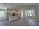 Open floorplan with kitchen, dining, and living area seamlessly connected for entertaining and Gathering time at 931 Azalea Walk Cir, Deland, FL 32724