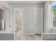 Bright bedroom with ensuite bathroom, and modern neutral finishes throughout at 10829 Royal Cypress Way, Orlando, FL 32836