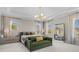 Bright main bedroom featuring ample natural light and a contemporary design at 10829 Royal Cypress Way, Orlando, FL 32836