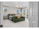 Bright main bedroom featuring ample natural light and a contemporary design at 10829 Royal Cypress Way, Orlando, FL 32836