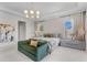 Bright main bedroom featuring ample natural light and a contemporary design at 10829 Royal Cypress Way, Orlando, FL 32836