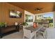 Outdoor kitchen featuring stainless steel appliances and countertop space at 10829 Royal Cypress Way, Orlando, FL 32836