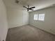 Empty bedroom with carpeting, ceiling fan, and natural light at 10955 Lemay Dr, Clermont, FL 34711