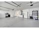 View of the garage, featuring abundant space and storage, and access to the home at 10955 Lemay Dr, Clermont, FL 34711