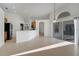 Open-concept living room with tile floors and plenty of natural light at 10955 Lemay Dr, Clermont, FL 34711