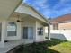 Covered patio with ceiling fan, ideal for outdoor relaxation and entertaining at 10955 Lemay Dr, Clermont, FL 34711