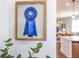 Award ribbon displayed in the home, adding a touch of prestige and highlighting the home's features at 1257 Champions Dr, Daytona Beach, FL 32124