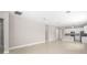 Open floor plan reveals a living space adjacent to the modern kitchen with ample natural light at 1257 Champions Dr, Daytona Beach, FL 32124