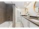 Beautiful bathroom featuring double sinks, modern fixtures, and a shower-tub combination at 1327 Bridgeport Dr, Winter Park, FL 32789
