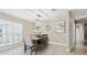 Elegant dining room featuring modern light fixture, neutral tones, and large shuttered windows for natural light at 1327 Bridgeport Dr, Winter Park, FL 32789