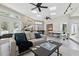 Spacious game room filled with natural light, featuring a pool table, foosball, and comfortable seating at 1327 Bridgeport Dr, Winter Park, FL 32789