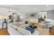 Open concept living space with kitchen and dining area, perfect for entertaining and Gathering gatherings at 1327 Bridgeport Dr, Winter Park, FL 32789