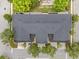 Birds eye view of the property with the roof, trees, and street layout visible at 14025 Oasis Springs Ln # 901, Windermere, FL 34786