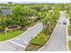 Community entrance with lush landscaping, providing a welcoming arrival to the residential area at 14025 Oasis Springs Ln # 901, Windermere, FL 34786