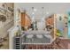 Stylish kitchen featuring stainless steel appliances, bar seating, and custom backsplash at 14025 Oasis Springs Ln # 901, Windermere, FL 34786