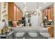 Modern kitchen featuring stainless steel appliances, ample cabinetry, and bar seating at 14025 Oasis Springs Ln # 901, Windermere, FL 34786