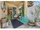 Inviting patio with modern chairs, lush plants, and sliding glass doors for seamless indoor-outdoor living at 14025 Oasis Springs Ln # 901, Windermere, FL 34786