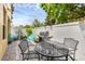 Outdoor patio featuring a grill, dining set, and comfortable chairs creating an inviting space for outdoor gatherings at 14025 Oasis Springs Ln # 901, Windermere, FL 34786