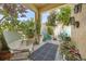 Relaxing patio featuring stone flooring, modern furniture and decorative plants at 14025 Oasis Springs Ln # 901, Windermere, FL 34786