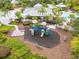 Playground featuring multiple slides, climbing areas, and soft ground cover for safe play at 14025 Oasis Springs Ln # 901, Windermere, FL 34786