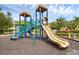 Colorful playground with various play structures, offering a fun and safe environment for  at 14025 Oasis Springs Ln # 901, Windermere, FL 34786
