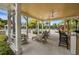 Covered poolside bar area, providing a relaxing space for refreshments and socializing by the pool at 14025 Oasis Springs Ln # 901, Windermere, FL 34786