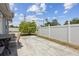 Spacious backyard area features a concrete patio area with a pristine white fence at 1432 Selma Ave, Orlando, FL 32825