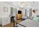 Shared bedroom includes two beds, a desk, neutral walls, and natural light from the windows at 1432 Selma Ave, Orlando, FL 32825