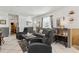 Inviting living area with a neutral color palette, comfortable seating, and easy access to the rest of the home at 1432 Selma Ave, Orlando, FL 32825
