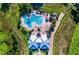 Overhead shot of the community pool and clubhouse with resort-style amenities and meticulously landscaped grounds at 14753 Snowy Egret St, Winter Garden, FL 34787