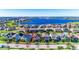 An inviting home is nestled in a community surrounded by lush landscapes and a serene lake at 14753 Snowy Egret St, Winter Garden, FL 34787