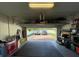 A well-organized garage with ample storage and a clear view of the driveway at 14753 Snowy Egret St, Winter Garden, FL 34787