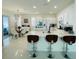 Modern open-concept kitchen with a large island and dining area at 14753 Snowy Egret St, Winter Garden, FL 34787