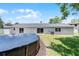 The backyard boasts an above-ground pool and well-manicured lawn, ideal for relaxation and outdoor activities at 174 Pine Grove Ct, Daytona Beach, FL 32119