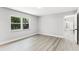 Bright bedroom with a large window that provides natural light and a view of the outside at 174 Pine Grove Ct, Daytona Beach, FL 32119