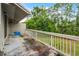 View of outdoor balcony with wooded views providing a serene and private space at 179 Crown Point Cir, Longwood, FL 32779