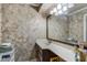 Bathroom featuring decorative walls, and a vanity with countertop space and sink at 179 Crown Point Cir, Longwood, FL 32779