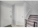 Foyer featuring closet, staircase, and tile floor at 179 Crown Point Cir, Longwood, FL 32779