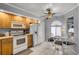 Bright kitchen featuring a ceiling fan and a breakfast nook with lots of light at 179 Crown Point Cir, Longwood, FL 32779