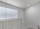 Bright stairway featuring white railing and neutral walls at 179 Crown Point Cir, Longwood, FL 32779