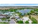Community amenities with a lake, pool, clubhouse, beach volleyball, and green spaces at 1943 Majorca Dr, Kissimmee, FL 34747