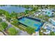 Aerial view of the basketball court with playground and lush greenery in a Gathering-friendly neighborhood at 1943 Majorca Dr, Kissimmee, FL 34747