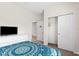 Comfortable bedroom features neutral walls and carpet, with a closet and dresser at 1943 Majorca Dr, Kissimmee, FL 34747