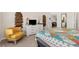 Bedroom with carpeted floors and views into the living area at 1943 Majorca Dr, Kissimmee, FL 34747