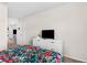 Bedroom featuring carpet, neutral paint, and a television on a bureau at 1943 Majorca Dr, Kissimmee, FL 34747