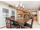 Bright dining area with a large table, perfect for Gathering meals and entertaining guests at 1962 English Dr, Deltona, FL 32738