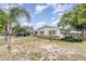 Spacious home with an attached garage and large yard, perfect for outdoor activities and entertaining at 1962 English Dr, Deltona, FL 32738